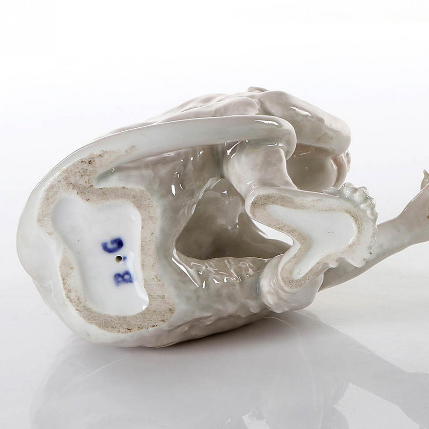 Porcelain figure "Monkey looks at the turtle"