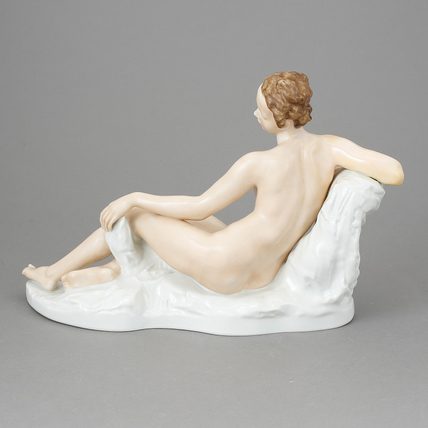 Large porcelain figure "Lying woman"