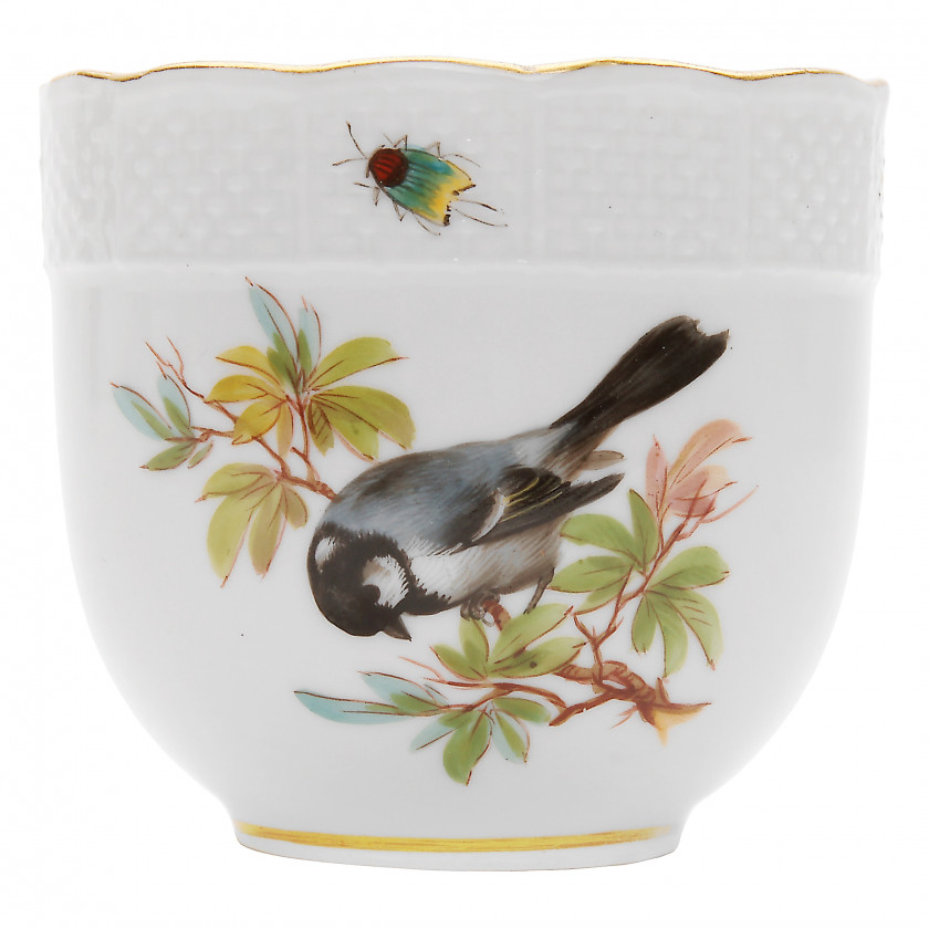 Porcelain tea cup and a saucer