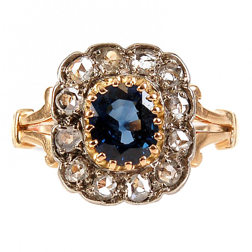 Gold ring with sapphire and diamonds