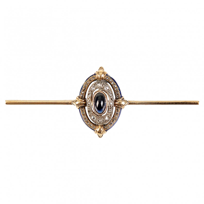 Gold brooch with sapphire and diamonds