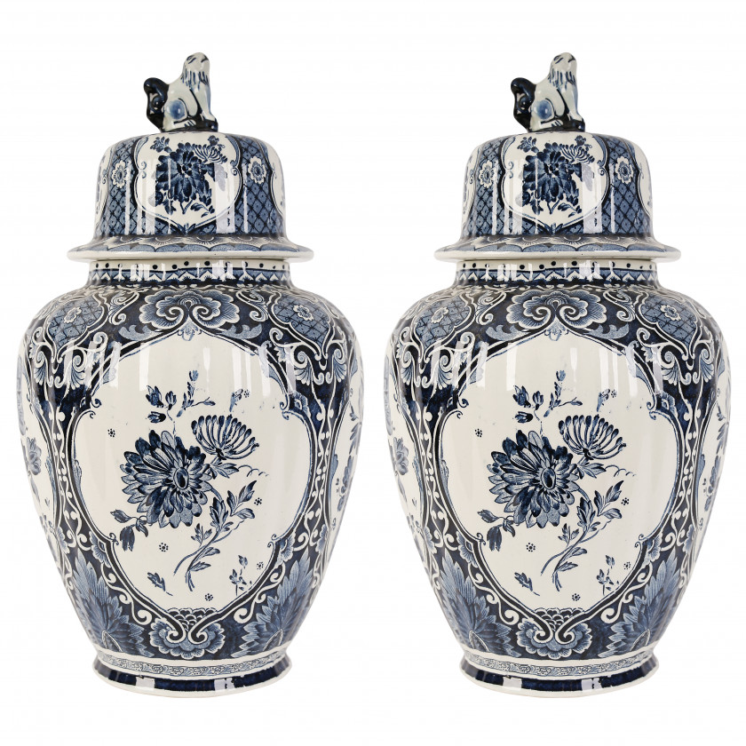 A pair of faience decorative vases