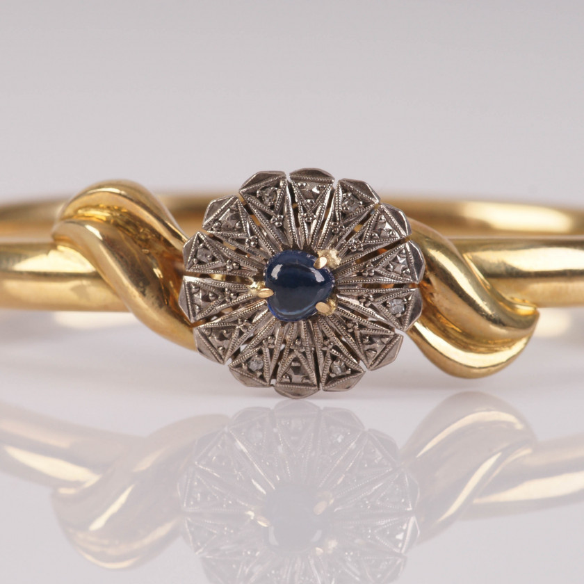 Gold bracelet with sapphire and diamonds