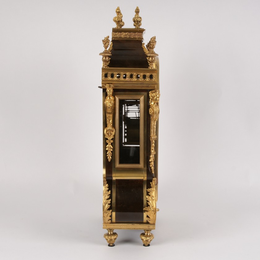 Bronze clock from tortoise shell with bronze elements