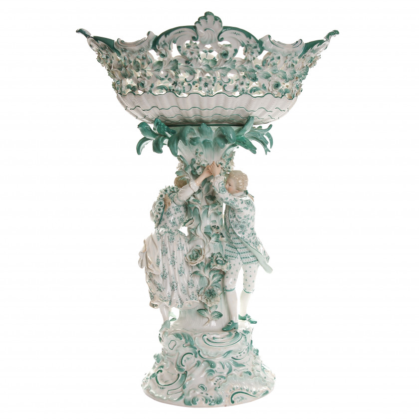 Porcelain flower-encrusted figural centerpiece