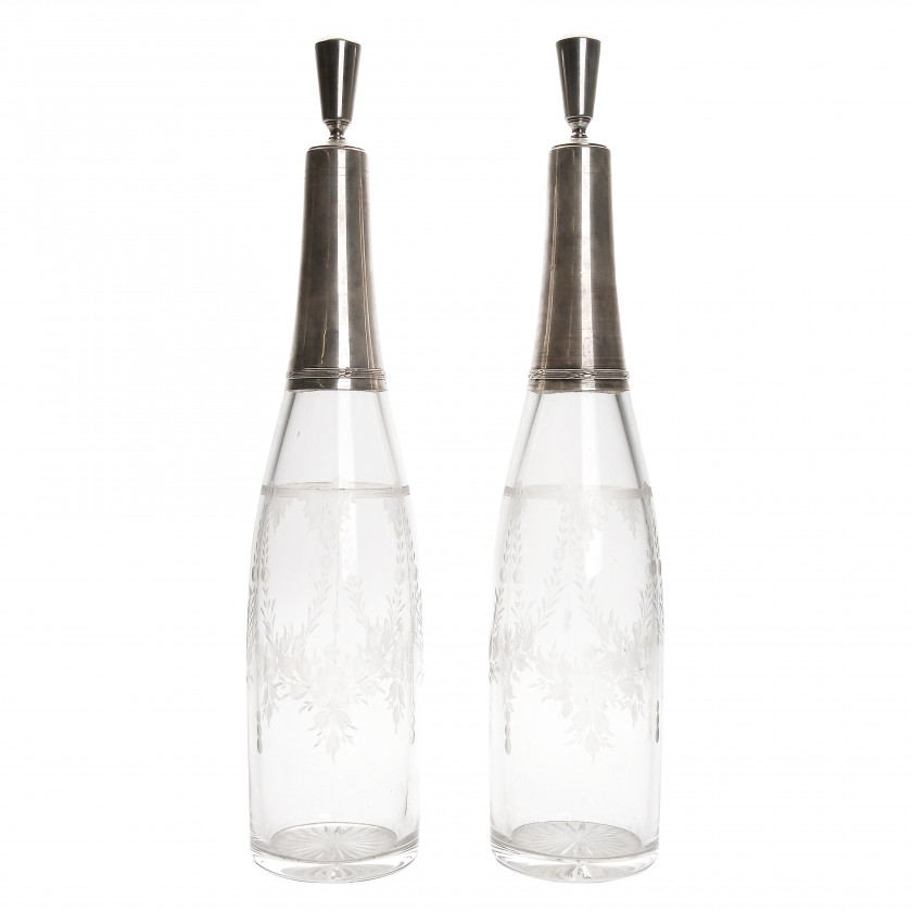 A pair of glass bottles
