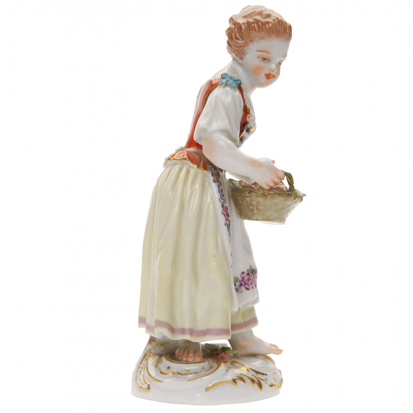 Porcelain figure "Gardener with a basket of flowers"