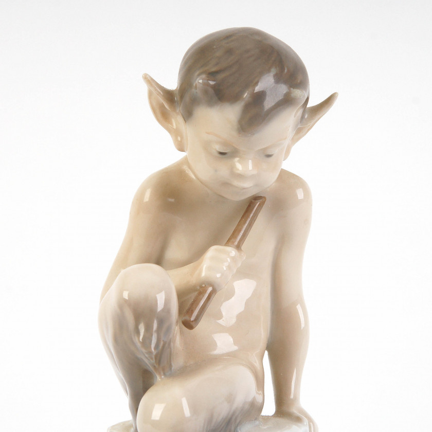 Porcelain figure "Faun with squirrel"