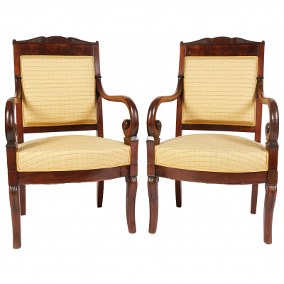 A pair of empire style armchairs