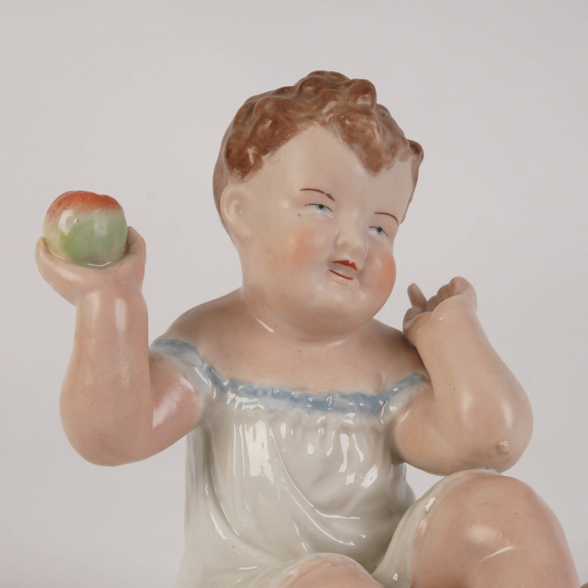 Porcelain figure "Baby with apple"