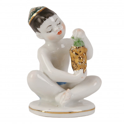 Porcelain figure "Boy with grape"