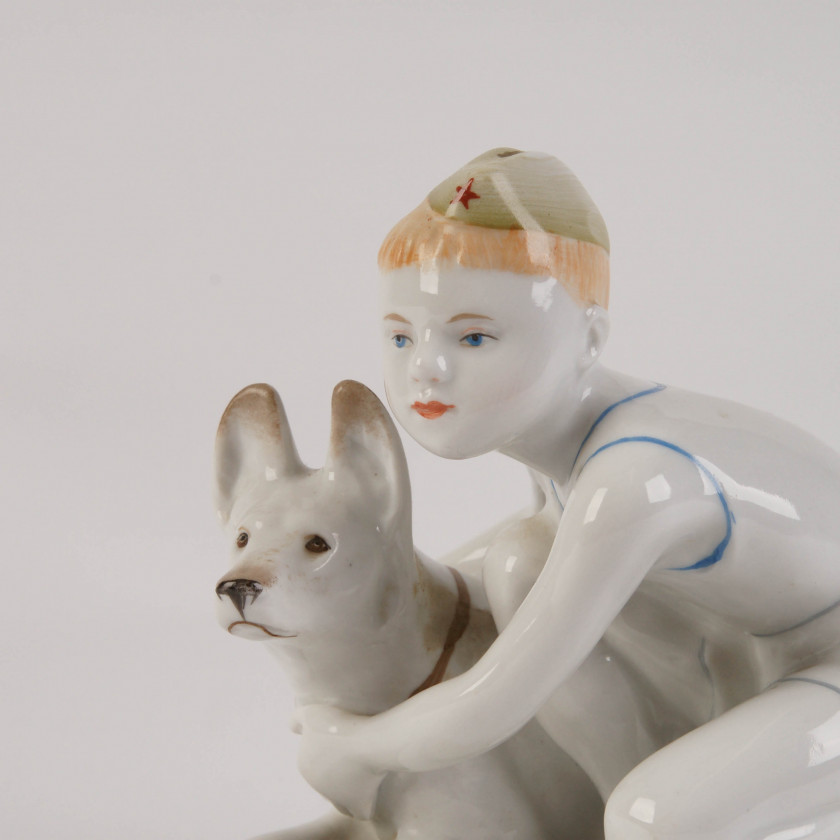 Porcelain figure "Young border guard with a dog"