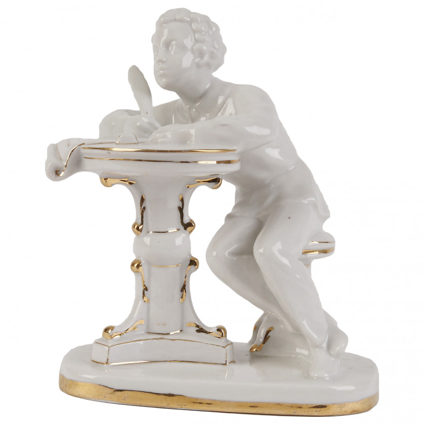 Porcelain figure "Young Pushkin at the table"