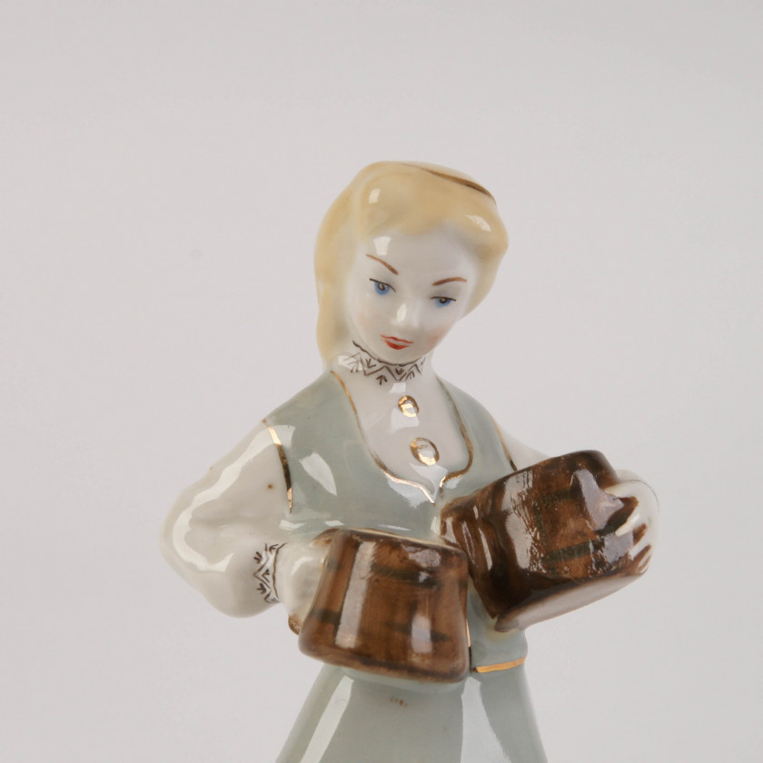 Porcelain figure "Girl with mugs"