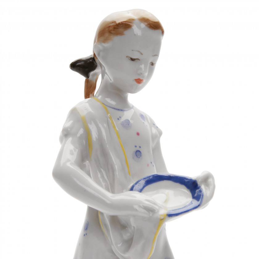 Porcelain figure "Young helper"