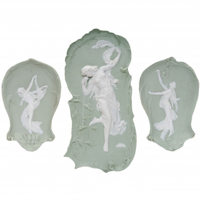 Three porcelain wall plaques in Wedgwood styl...