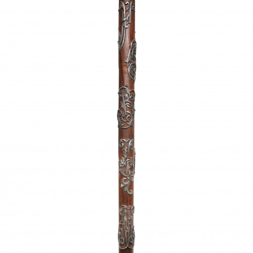 Wooden cane with silver handle