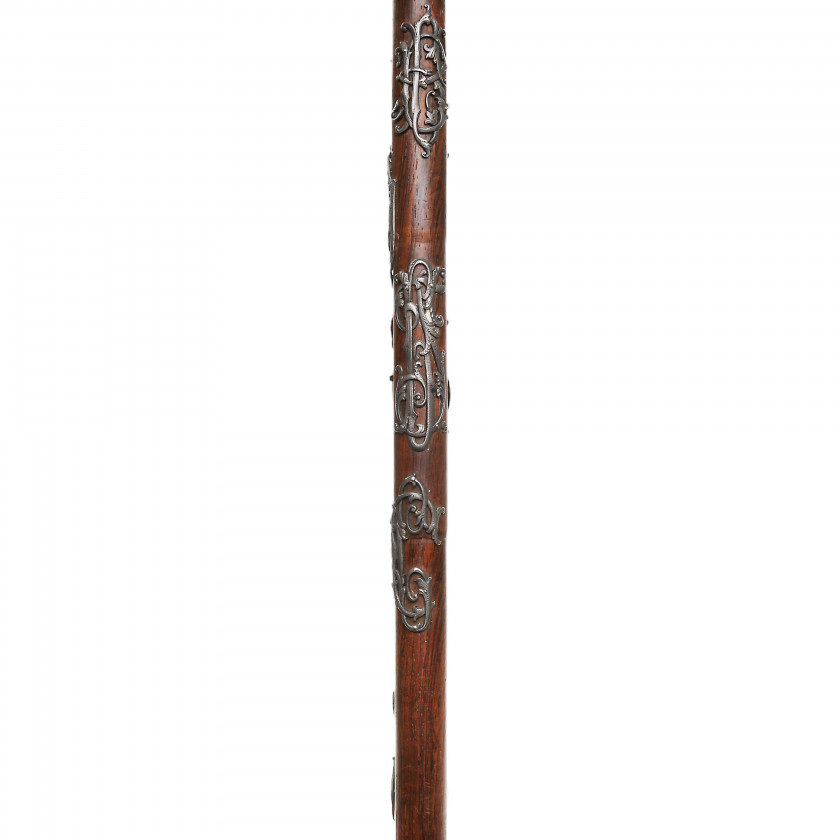 Wooden cane with silver handle