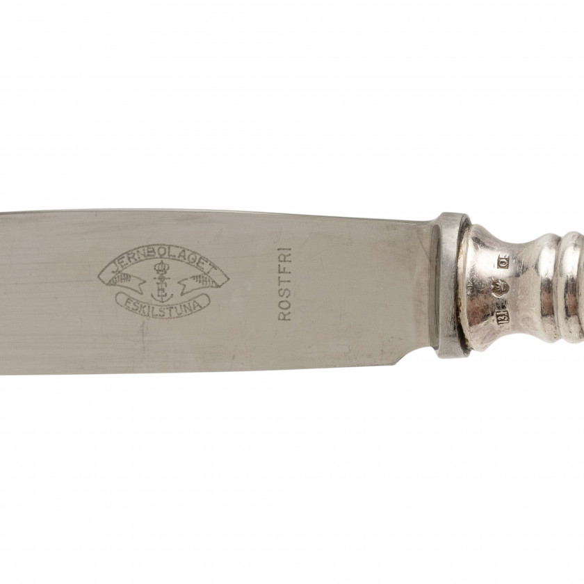 Silver flatware set for 12 persons