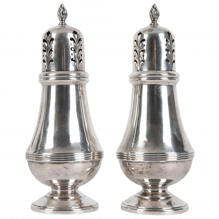 A pair of silver salt and pepper shakers