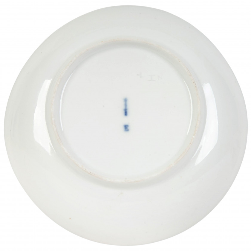 Фарфоровая кофейная чашечка с блюдцем