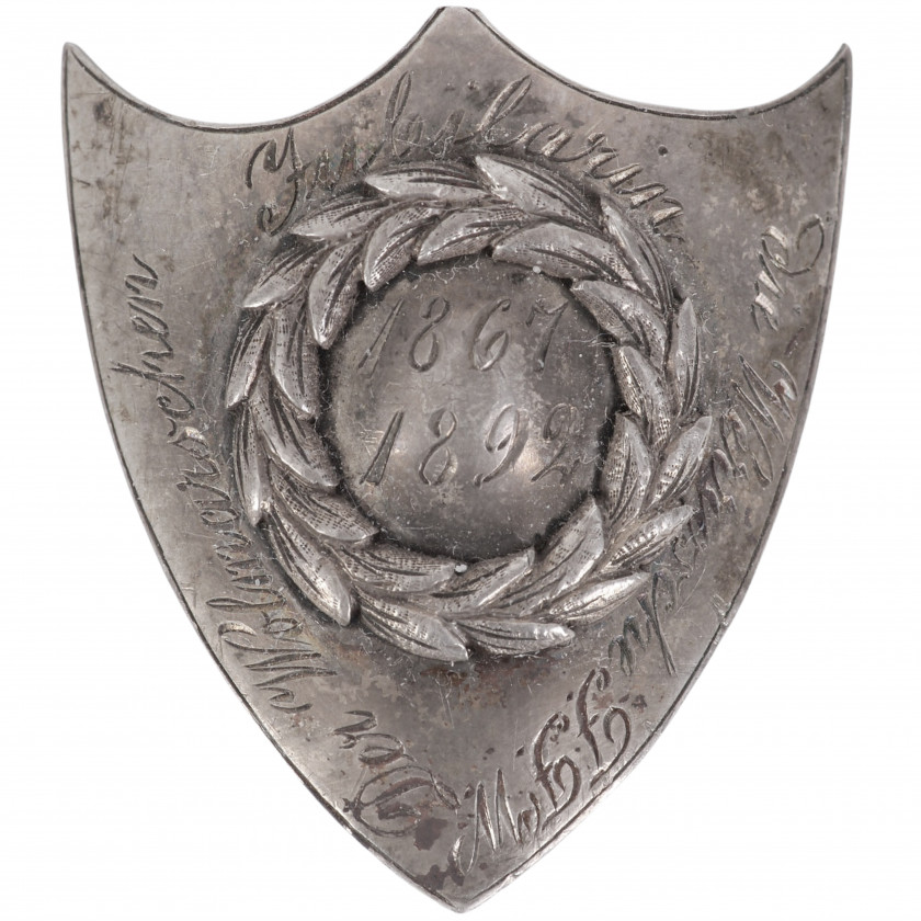 Jubilejas karoga kāta nagla "Dāvana Volmāras (Valmiera, Latvija) brīvprātīgo ugunsdzēsēju komandai no Veravas (Veru, Igaunija) brīvprātīgo ugunsdzēsēju komandas 25 gadu jubilejā"
