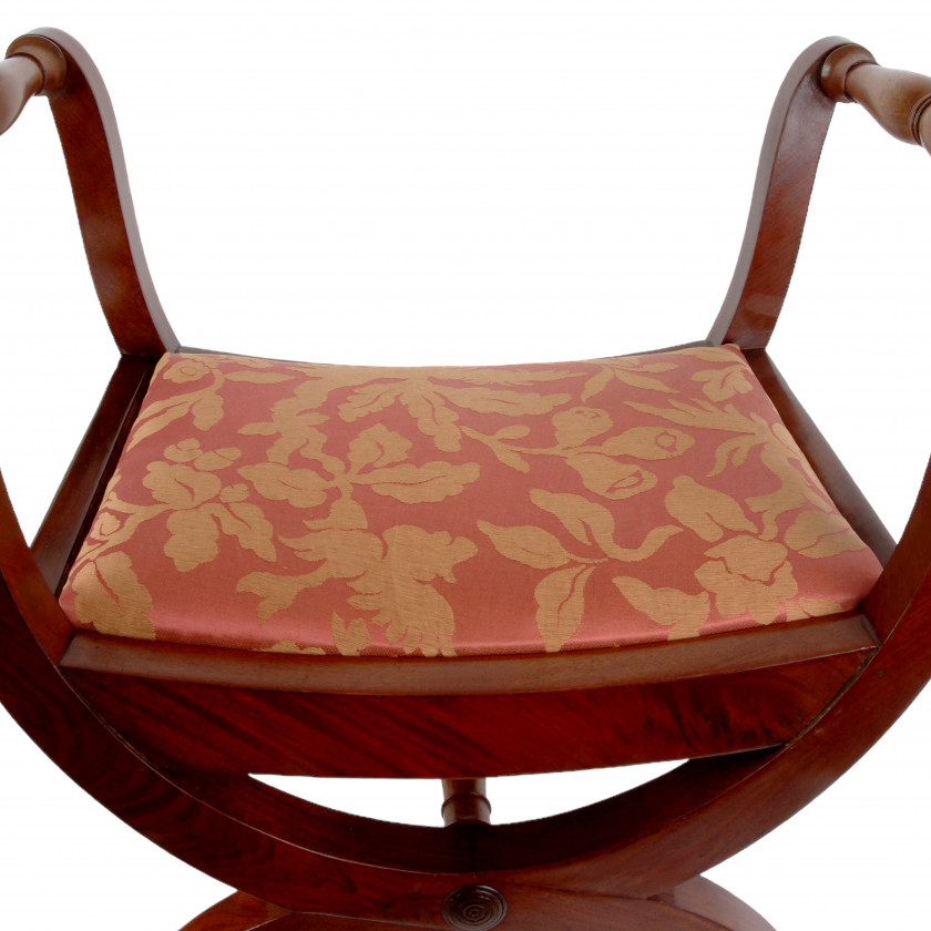 A pair of mahogany stools