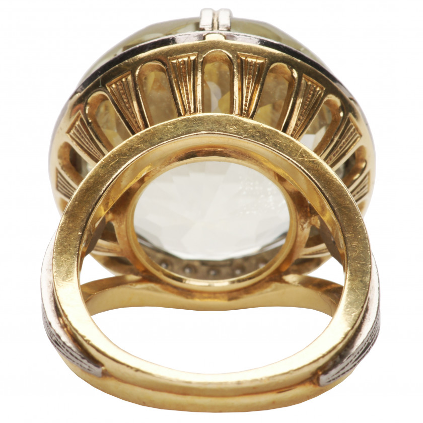 Gold ring with spodumene and diamonds