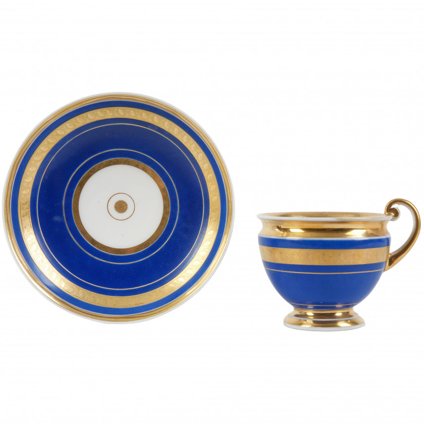 Porcelain tea cup and a saucer