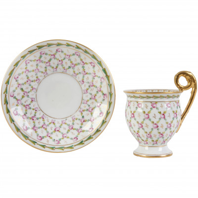 Porcelain tea cup and a saucer