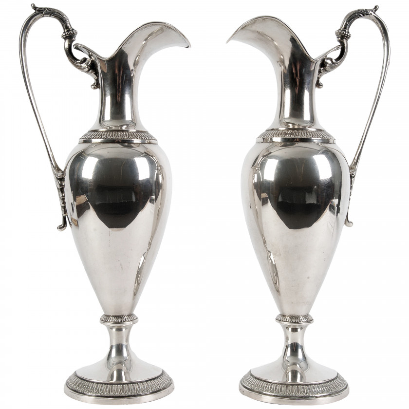 A pair of silver jugs