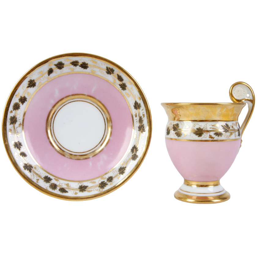 Porcelain tea cup and a saucer