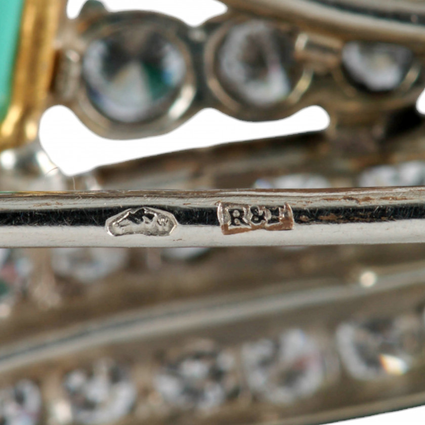 Gold earrings and brooch with emeralds and diamonds