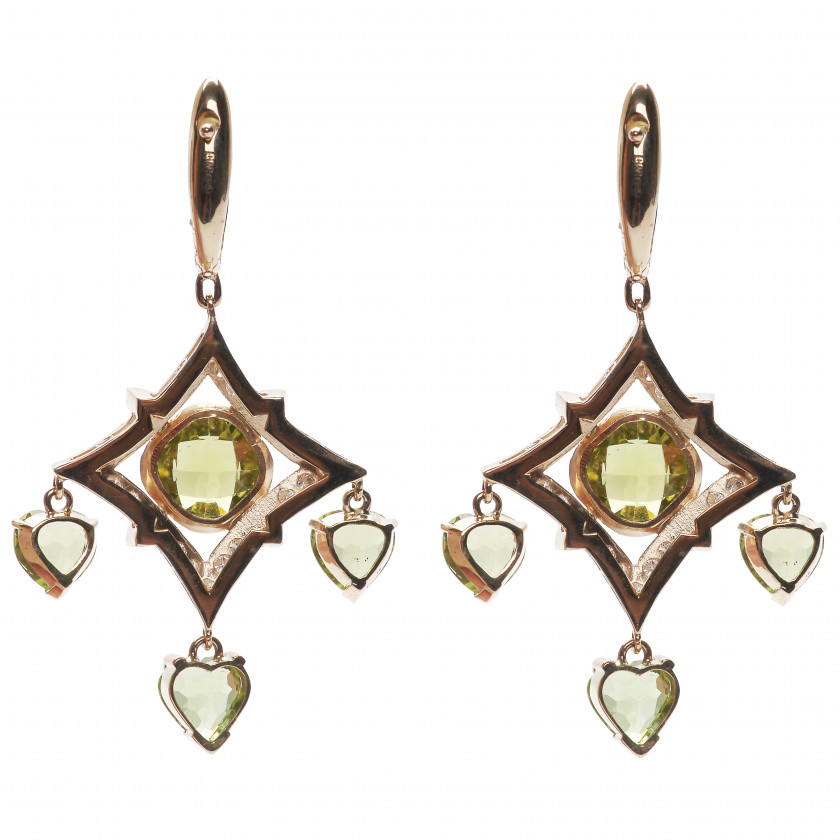 Gold earrings with diamonds, peridots and rubies