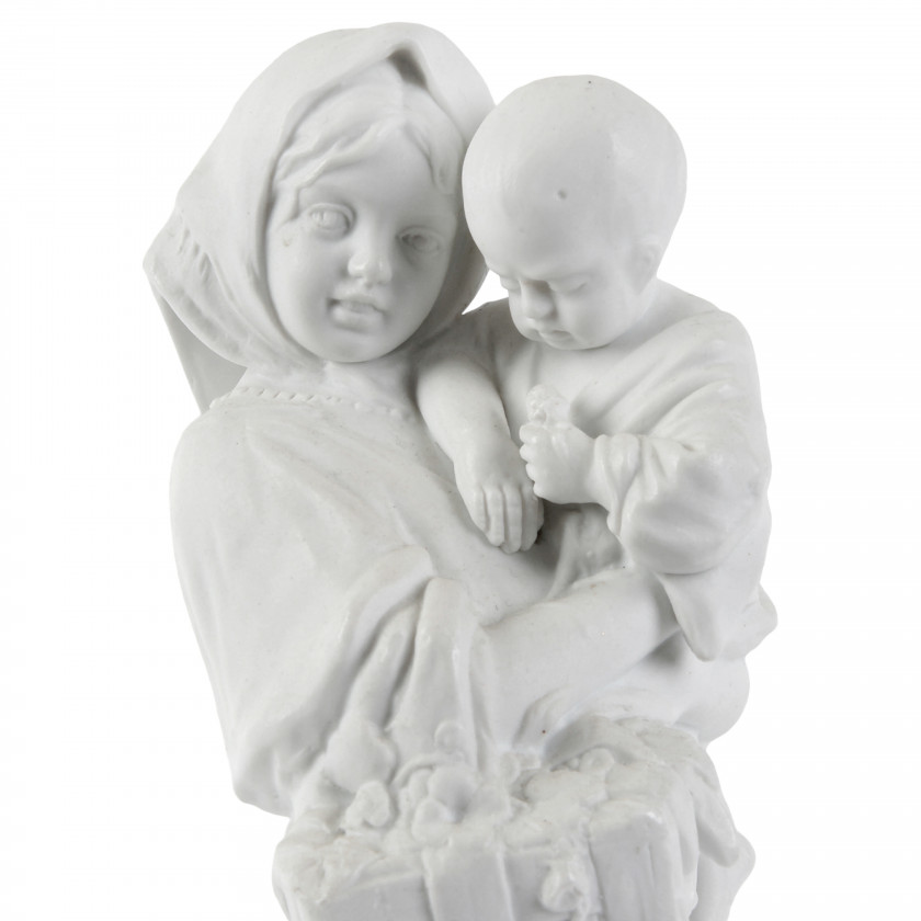 Porcelain figure "Girl with a child in her arms"