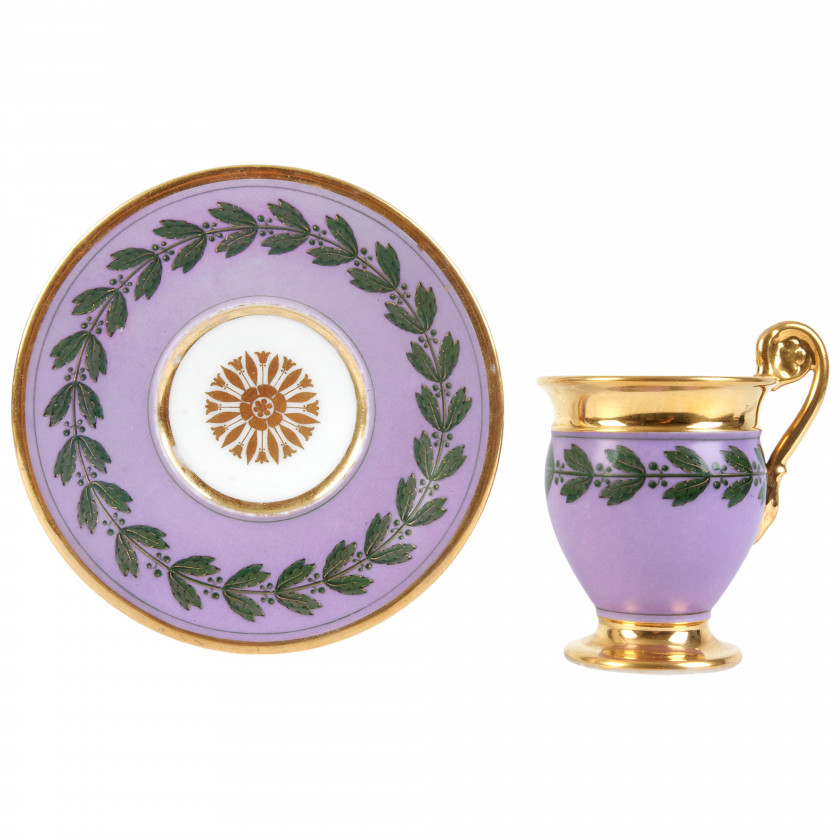 Porcelain tea cup and a saucer