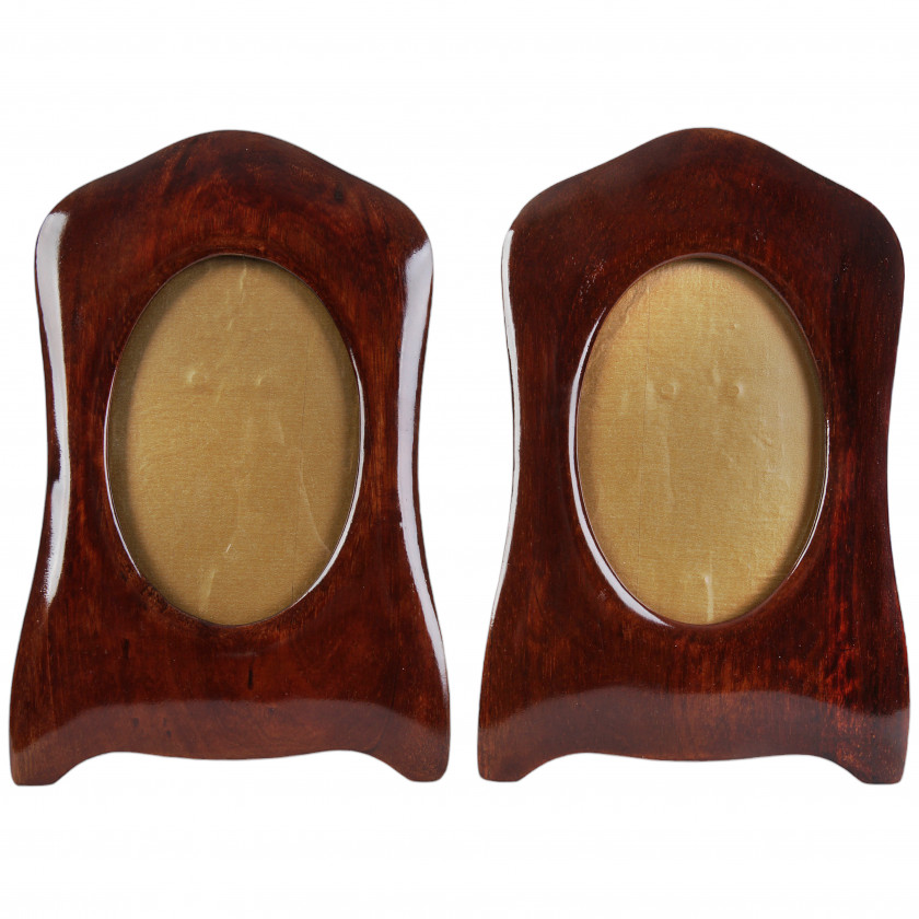 A pair of wooden photo frames