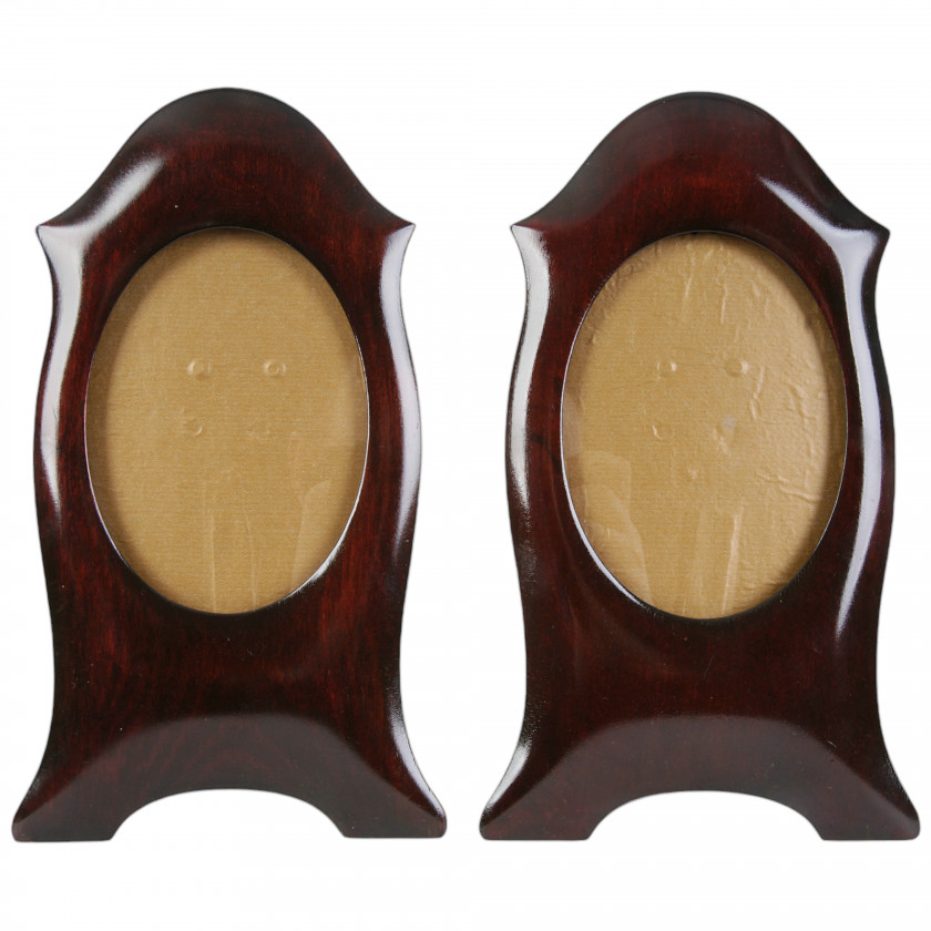 A pair of wooden photo frames